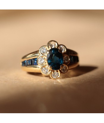 Bague marguerite saphirs serti rail et diamants sur le site 