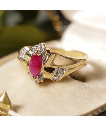 Bague rubis navette diamants ouvre sa boutique