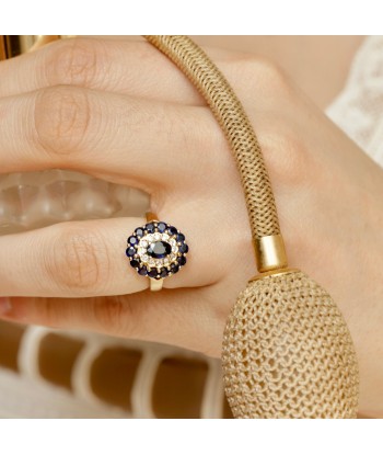 Bague marguerite diamants et saphirs hantent personnes